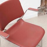 Vintage Matrix design chair by Thomas Tolleson with red armrests