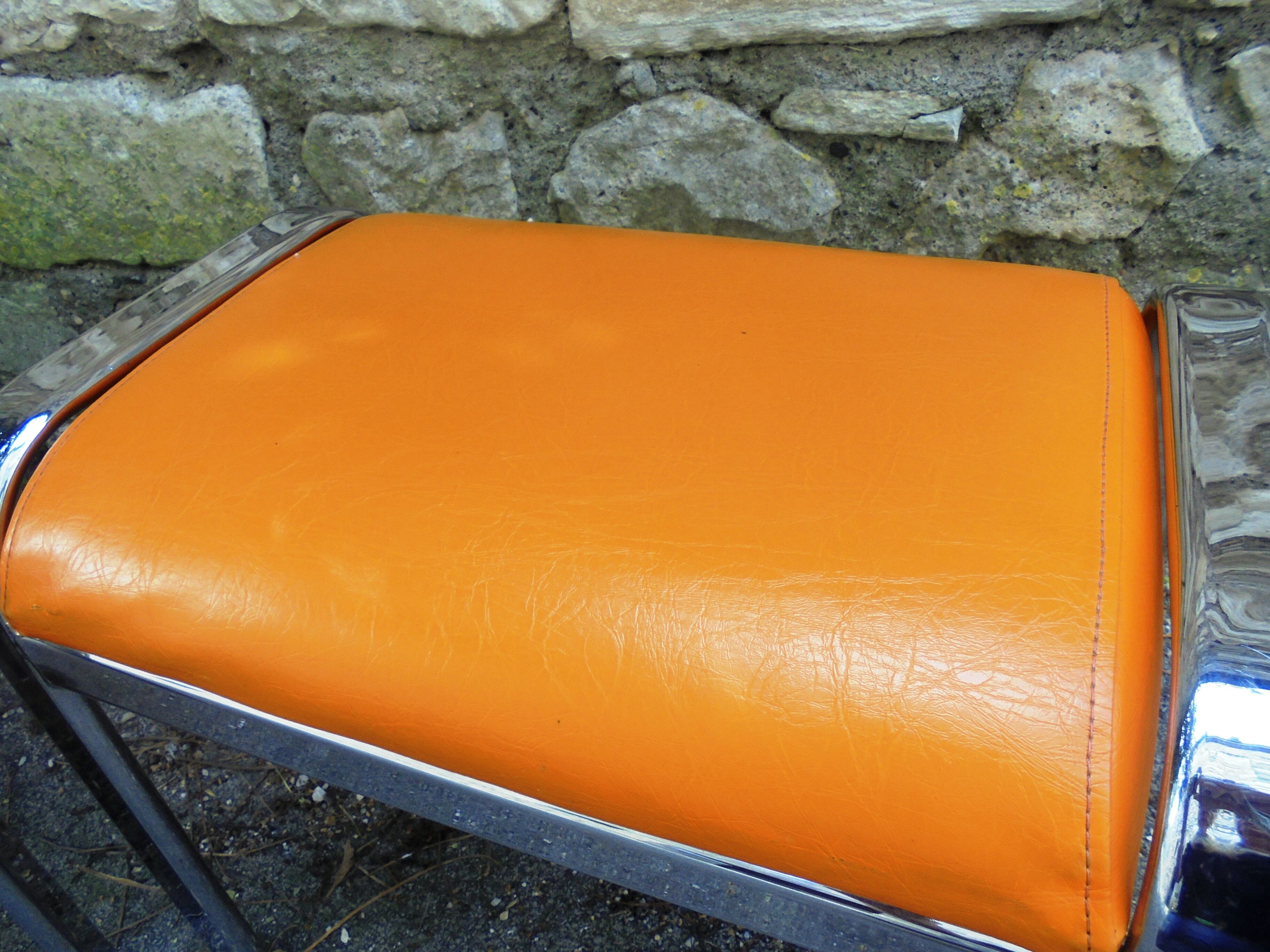 Pair of chrome and faux orange vintage stools "70"