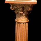 Bronze candle holder with floral motifs.