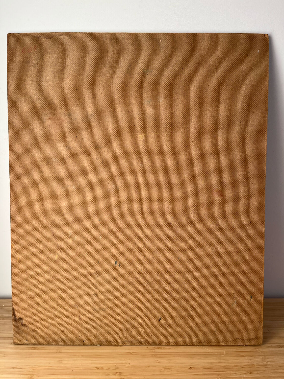 Bouquet of flowers on a red tablecloth, knife on a board, signed Renzo.