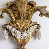 Pair of Louis XVI style wall lights in gilded and lacquered wood. Circa 1900.