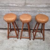 3 vintage oak and leather bar stools from the 1970s