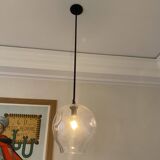 Suspension design by Lindsey Adelman studio in oil-rubbed bronze and clear glass.