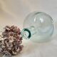 Demijohn in vintage transparent glass