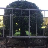 Old glass roof with door and window
