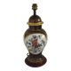 French Limoges Hergé table lamp base with gold highlights and floral decoration.