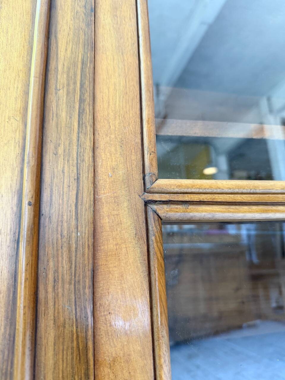 Glass-fronted walnut library 1900