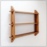 Wall shelves with dowels in Arts & Crafts style