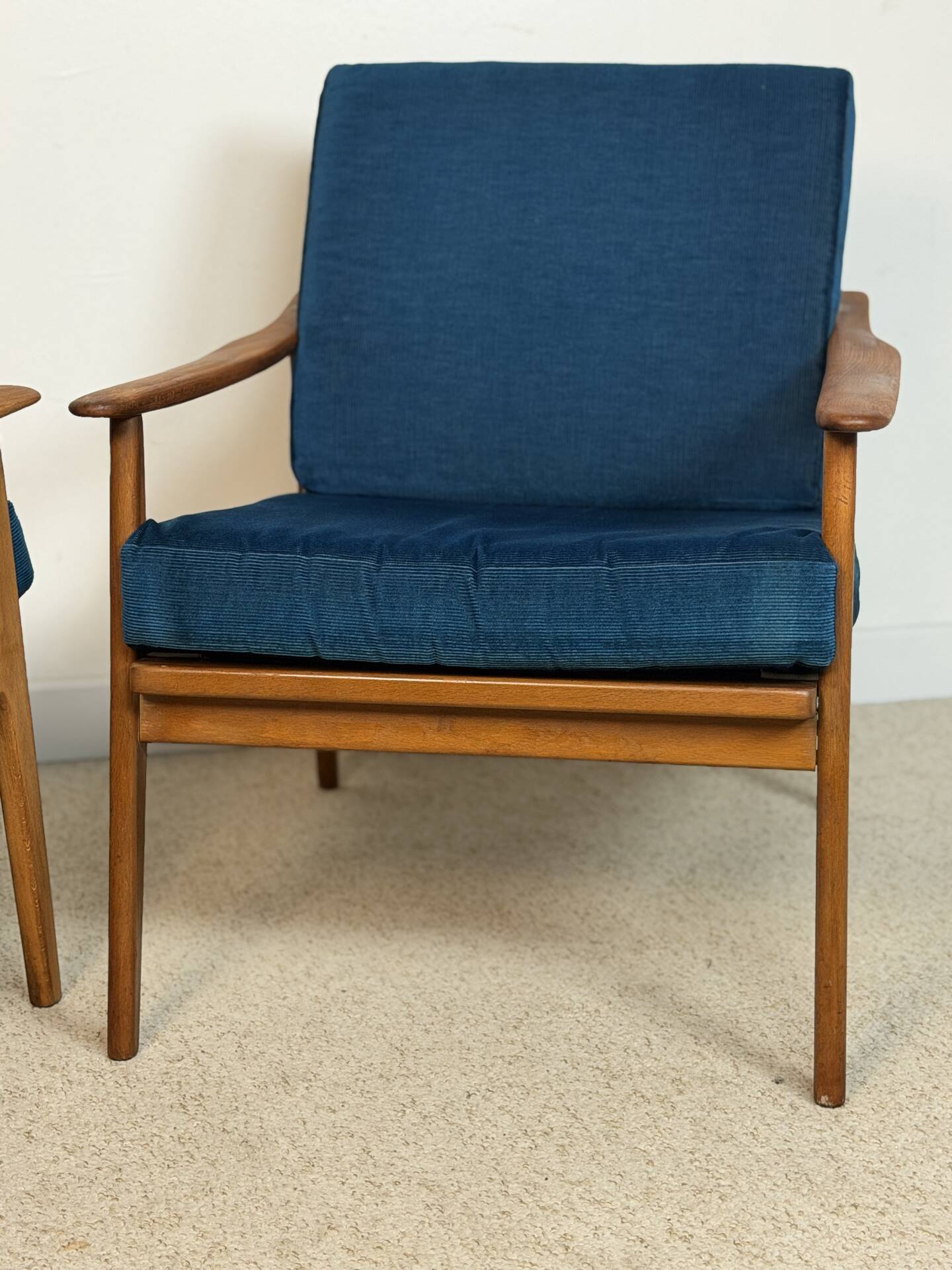 a pair of Scandinavian armchairs in teak from the 1960s