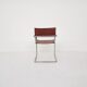 Tubular dining chair with arm rests, 1970's