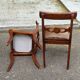 4 Regency chairs in solid wood and brown-beige leather from the 19th century.