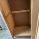 Vintage Parisian wardrobe with one mirrored door from the 60s in pine and wood