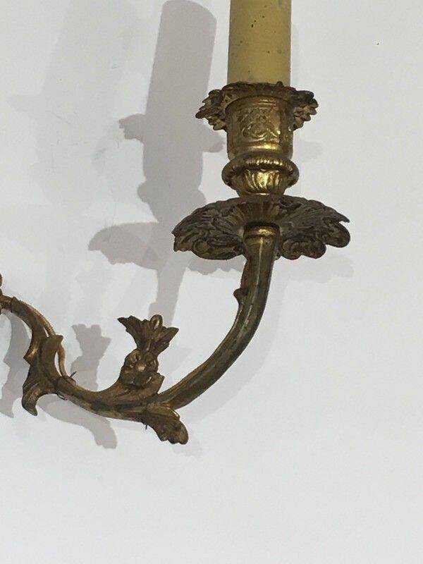 Pair of Louis XV style bronze wall sconces