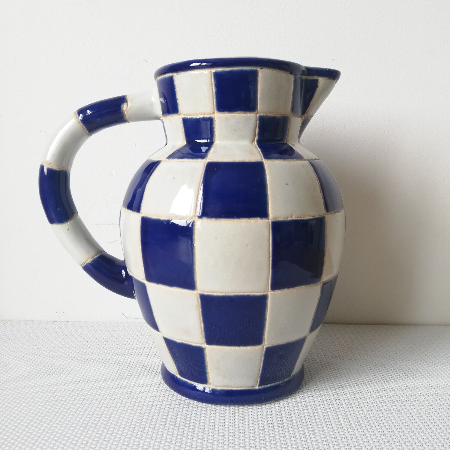 Checkerboard pitcher
