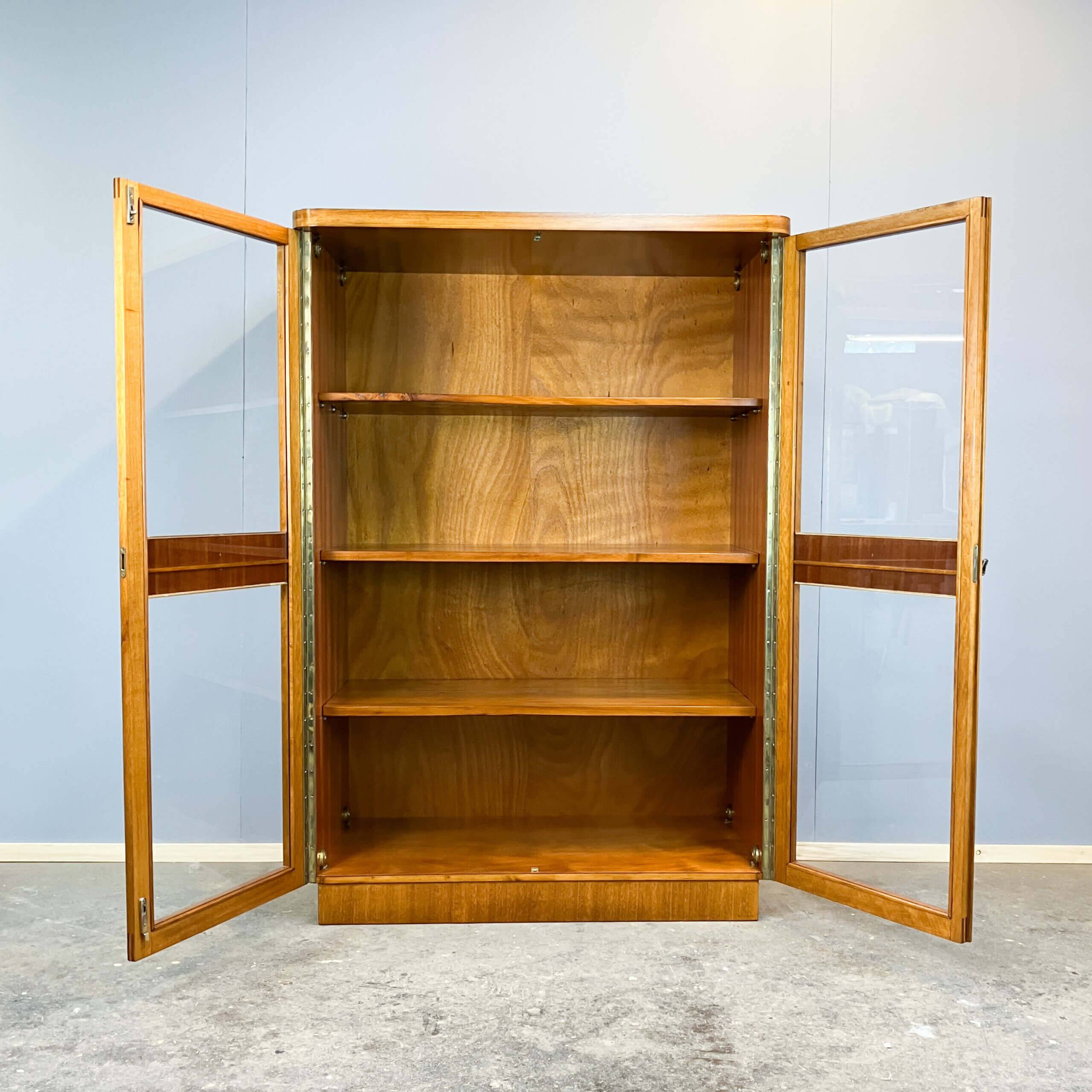 Art Deco cabinet with glass doors, various woods, 1930s