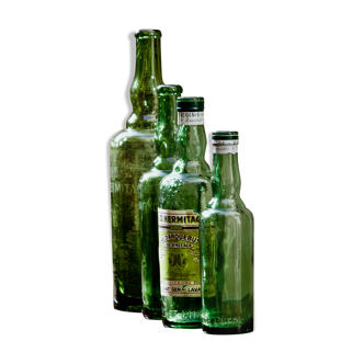 Lot de 4 bouteilles anciennes "L'Hermitage" eau d'arquebuse de Saint Genis Laval (Dept 69)