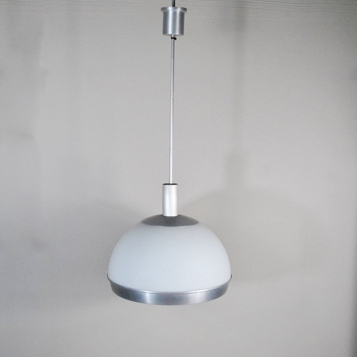 Suspended lamp in plexiglass and steel with faceted glass light by Pia Guidetti Crippa, 1960s.