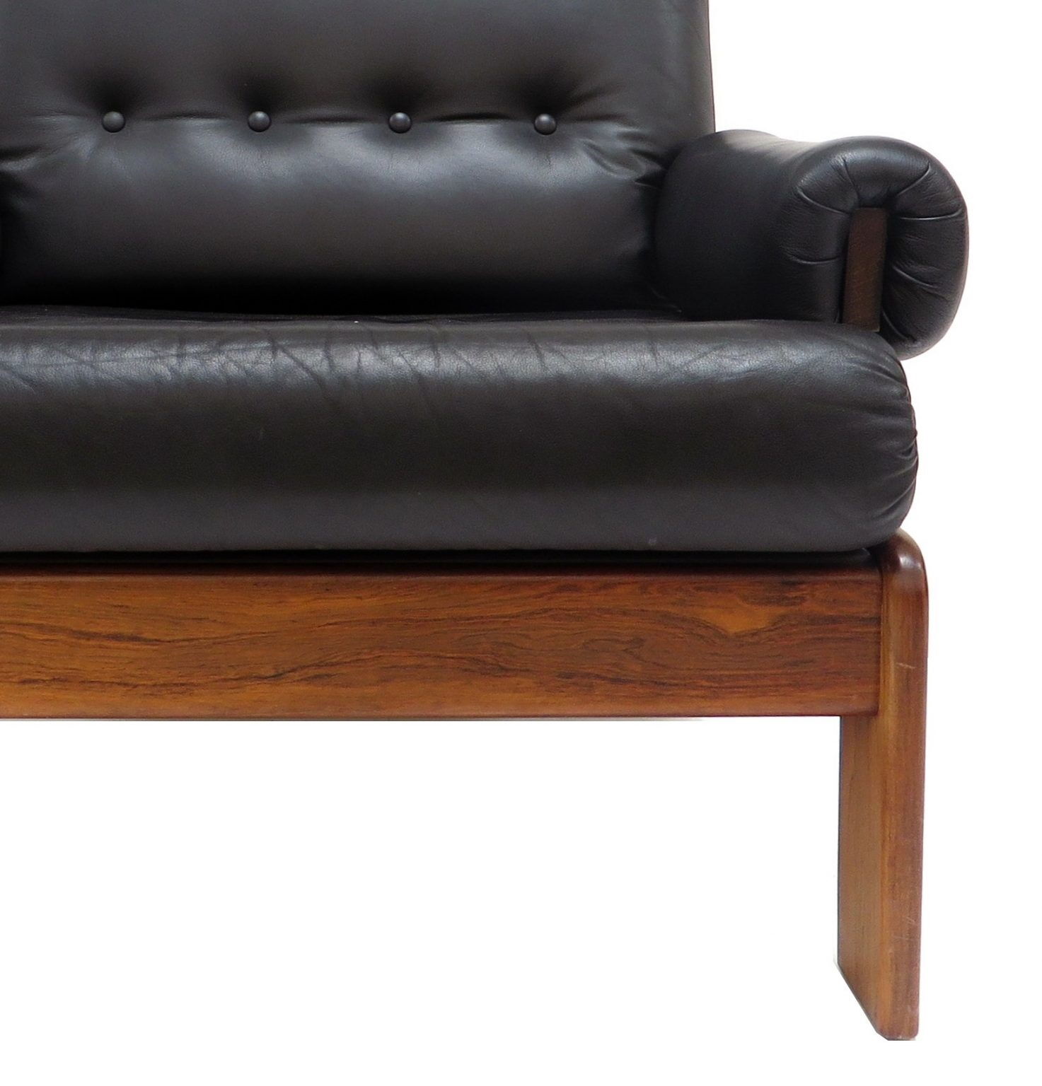 Vintage black leather armchair with solid rosewood frame made in the 1960s