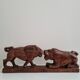 Lion and hippopotamus wood sculpture