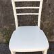 White wooden chairs