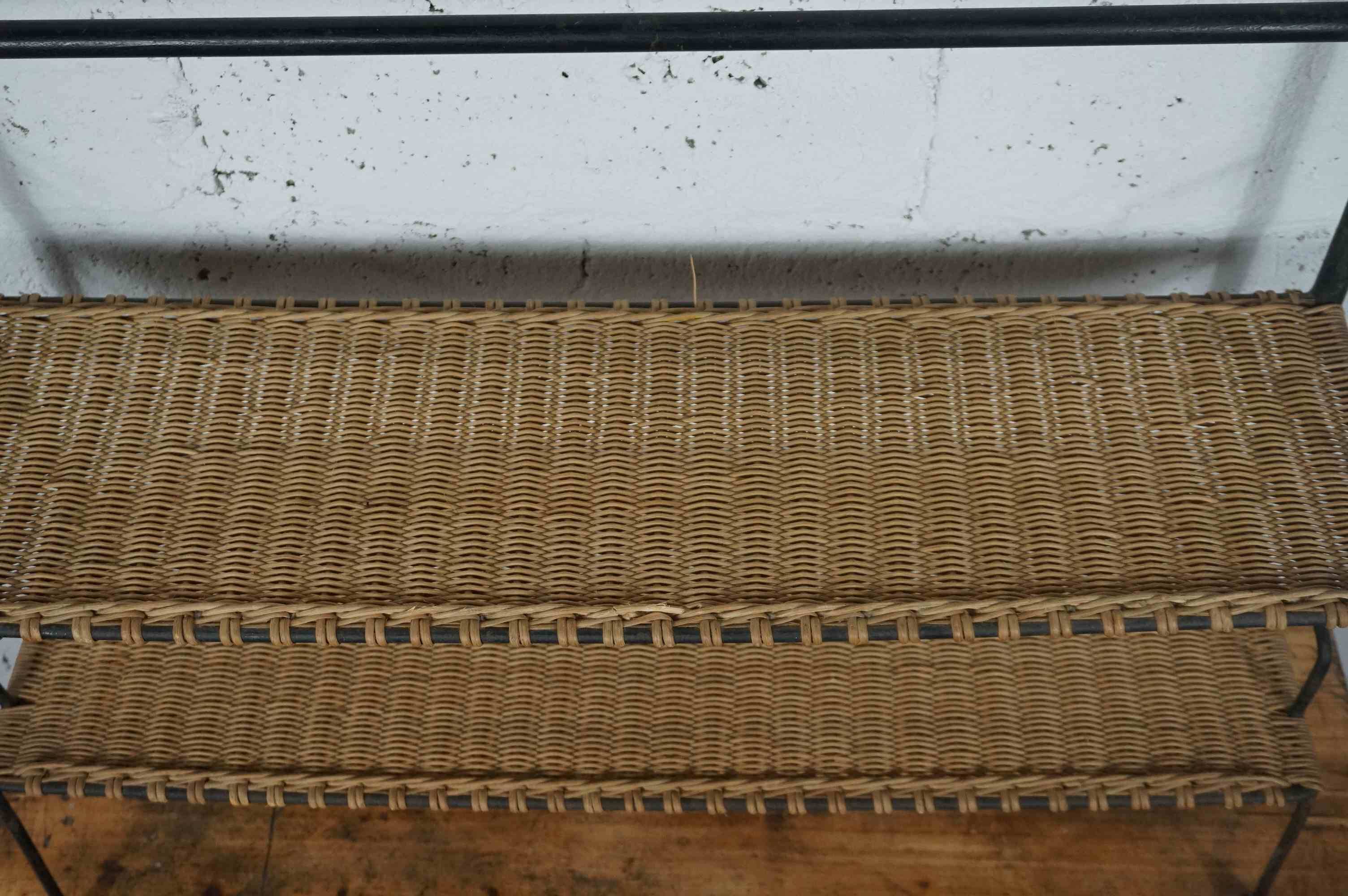 low metal and rattan shelf from the 50s