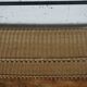 low metal and rattan shelf from the 50s
