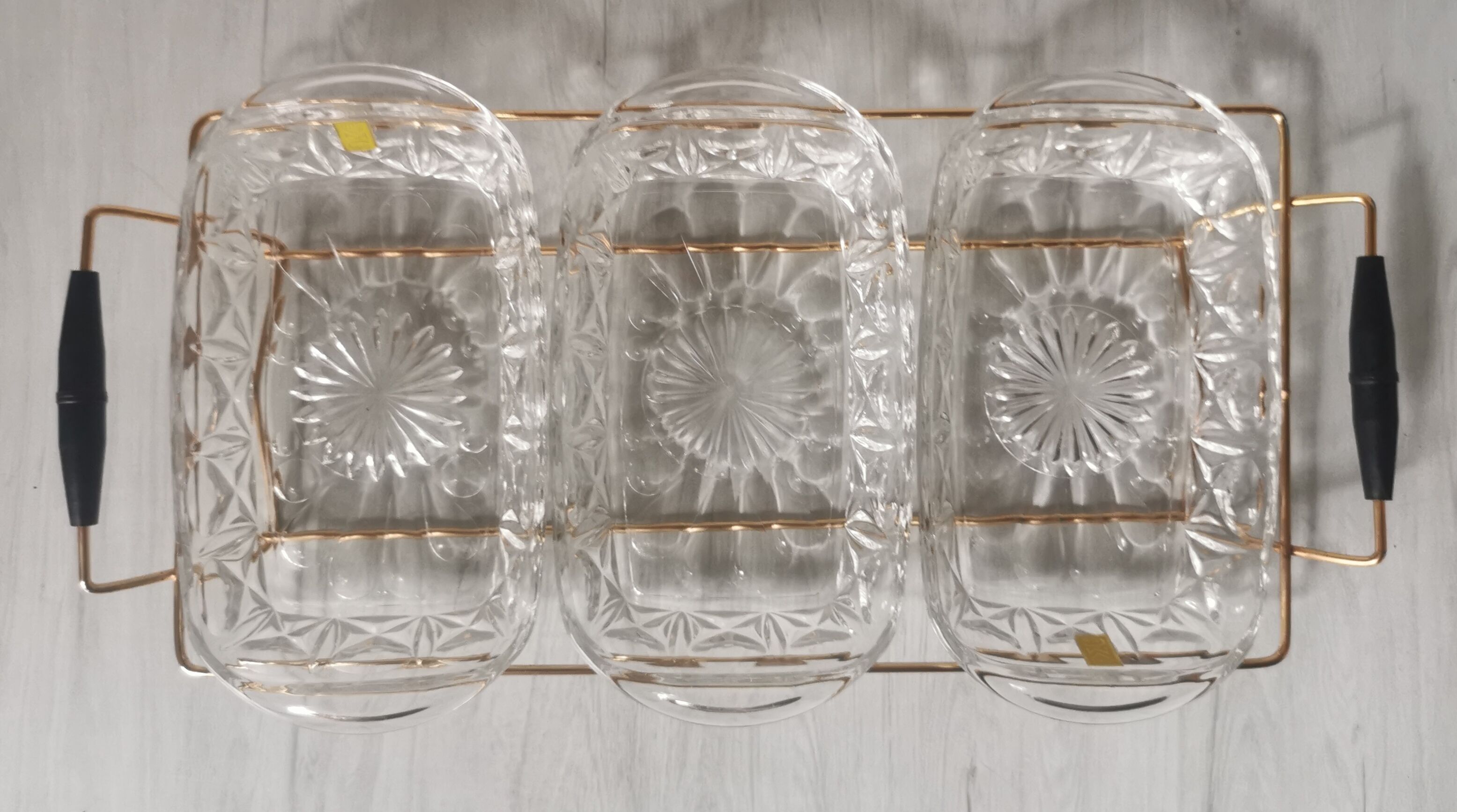 Tray with glass and gold metal compartments