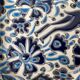Vintage handmade blue ceramic ashtray with deer and flower ornament from Rodos Ceramics.