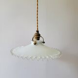 Serrated opaline suspension