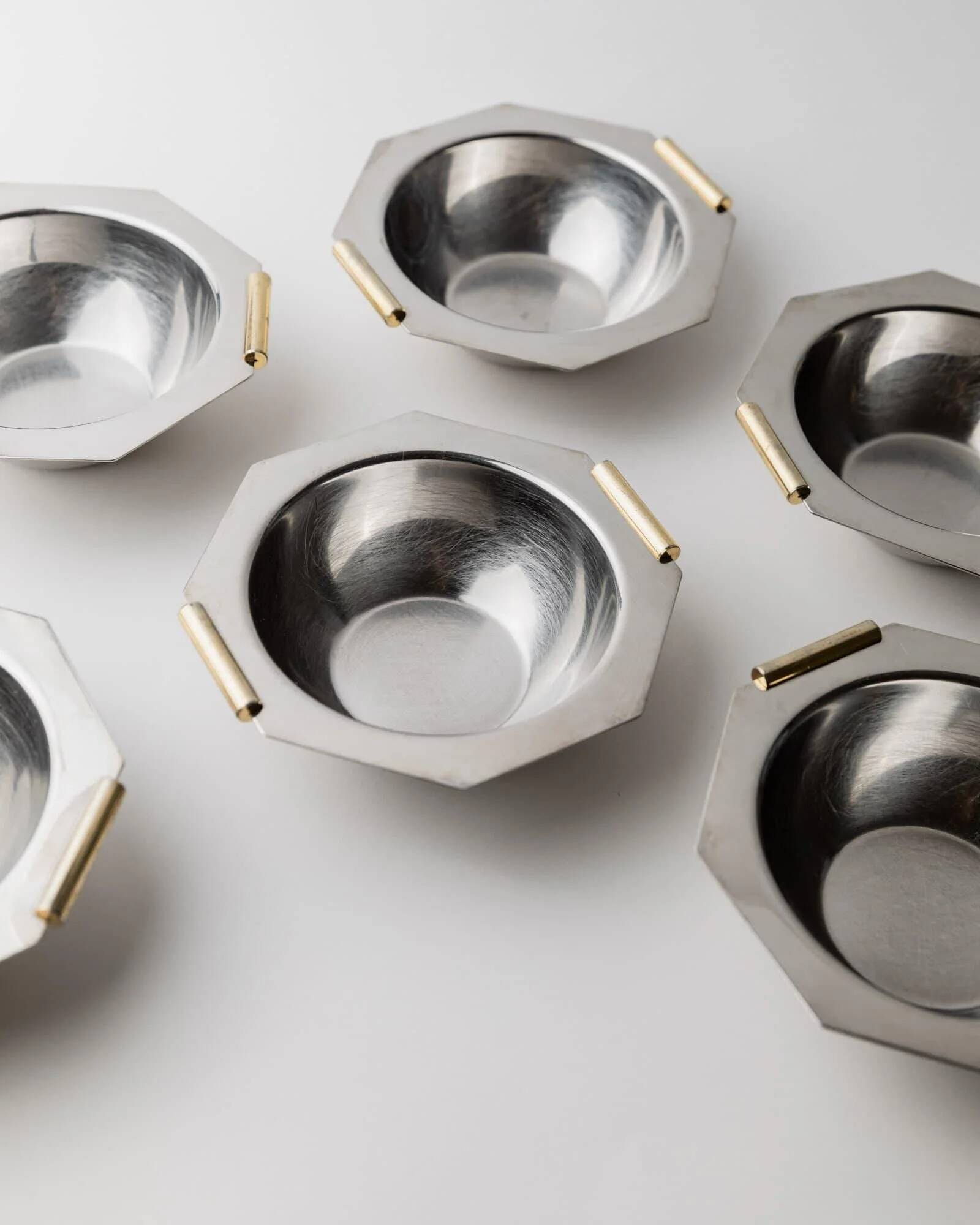 1980s vintage bowls, set of 8, stainless steel with gold handles.