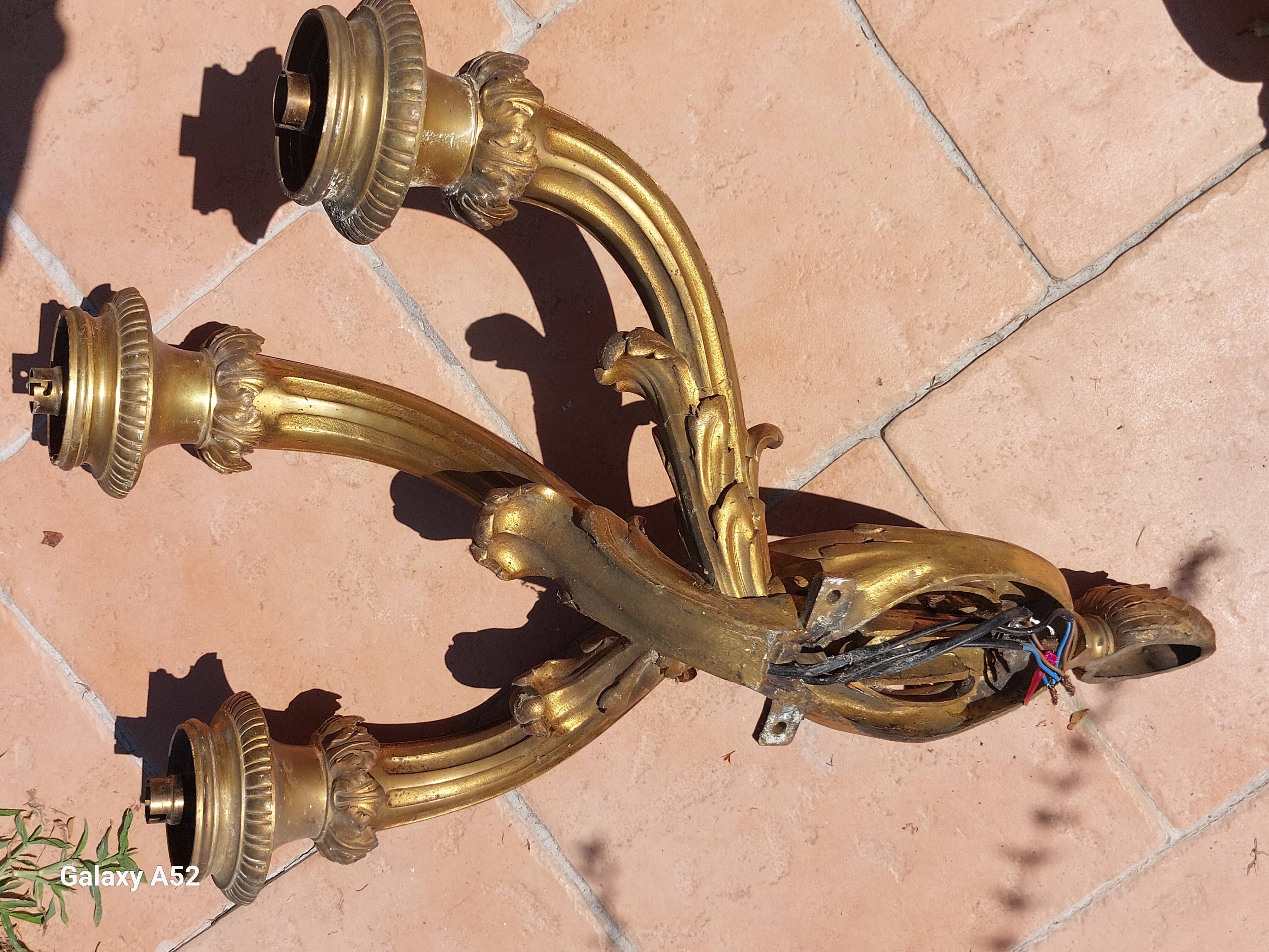 Pair of Louis XVI style wall sconces in bronze from the early 20th century, weighing 12 kg and 70 cm high.