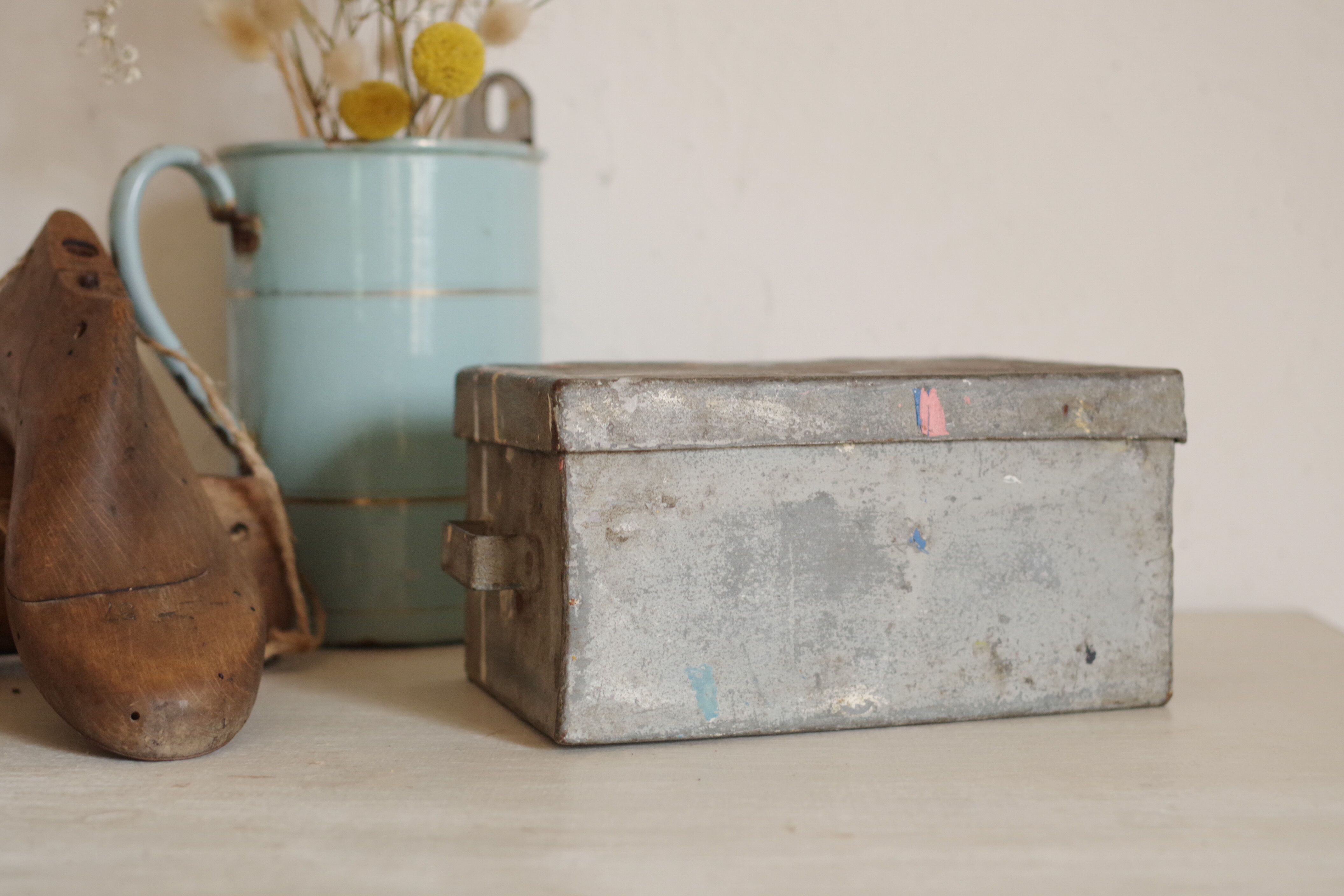 Small old white metal box