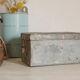 Small old white metal box