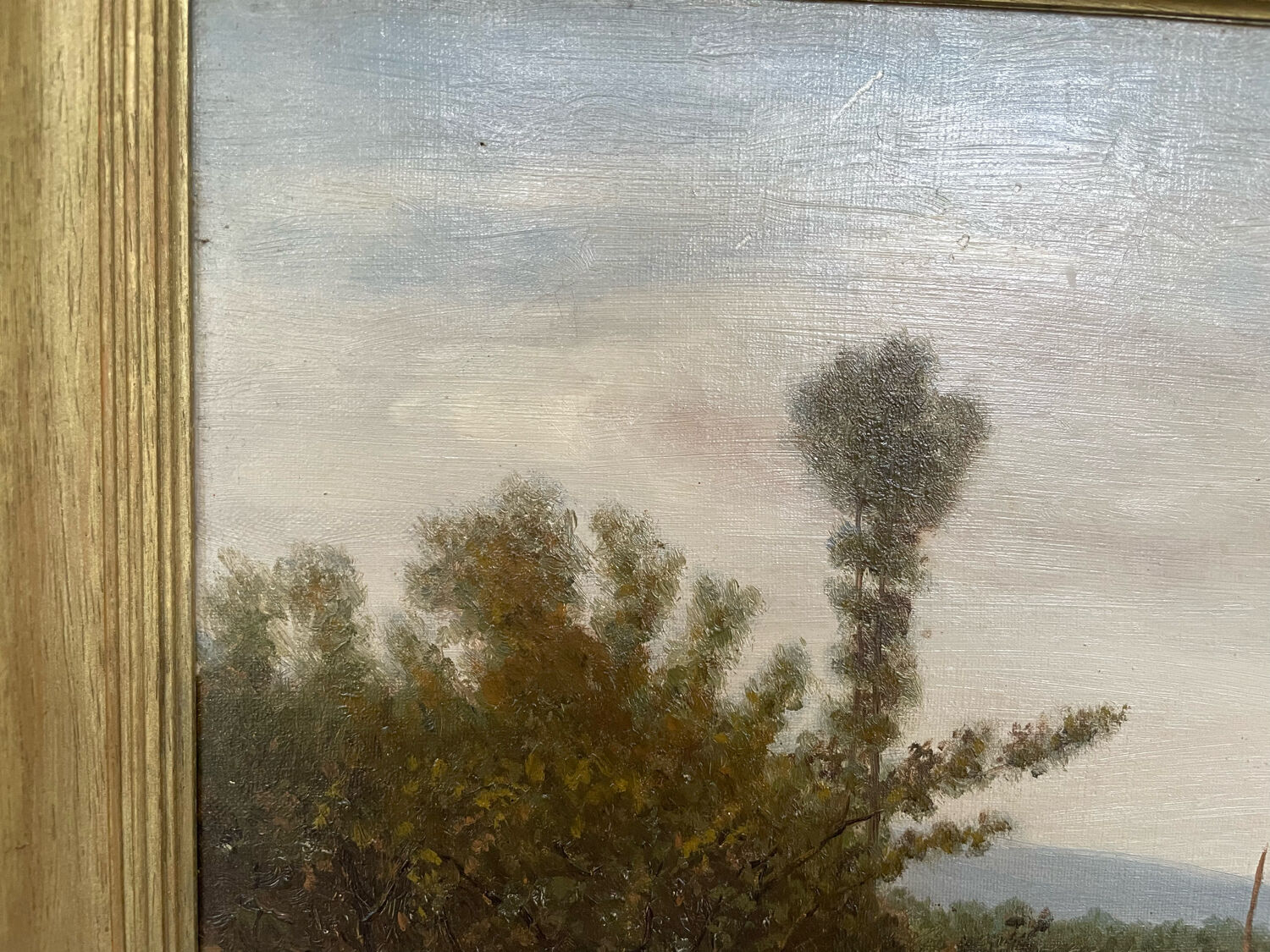 Oil painting of a riverside signed EM