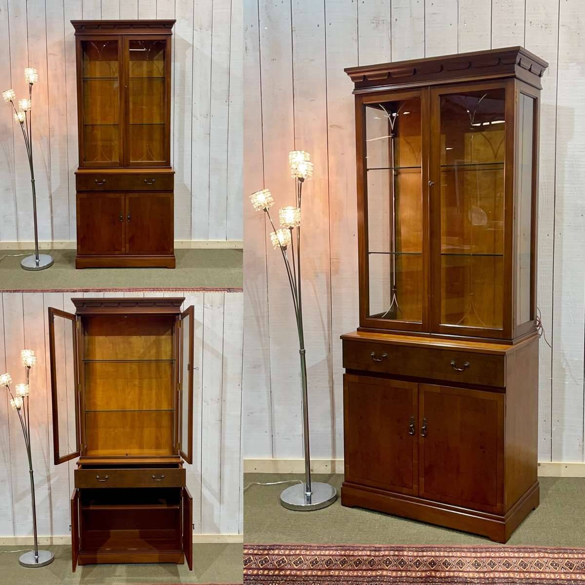 English display cabinet with two sections made of yew from the 1980s.