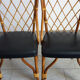 Pair of rattan and black skai bamboo chairs, 60s