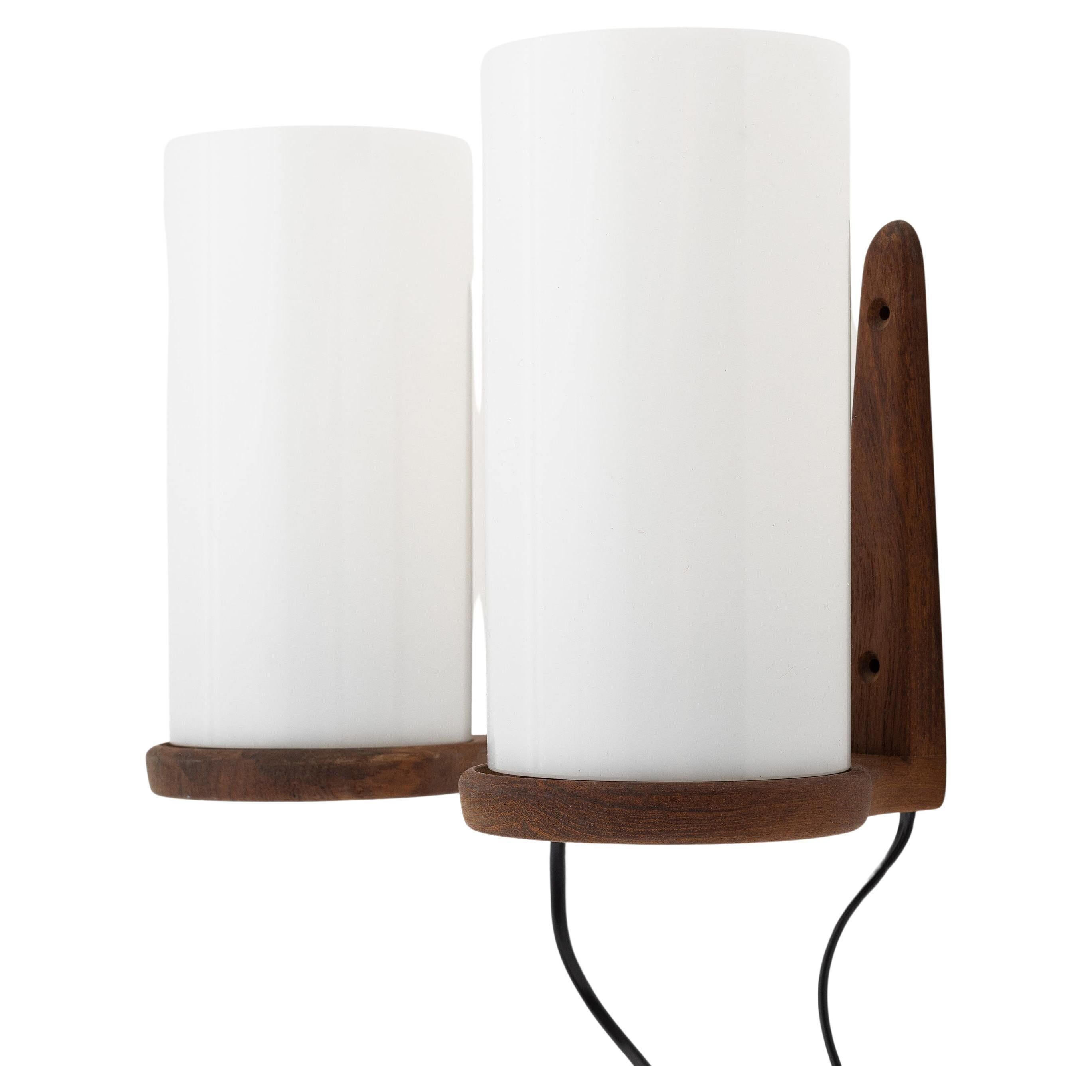Uno & Östen Kristiansson 2 teak wall lights for Luxus Sweden 1960