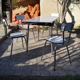 Set of table and four chairs formica
