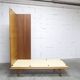 French wardrobe with tapered legs, 3 doors, 1 mirror (27*130), and 1 drawer.