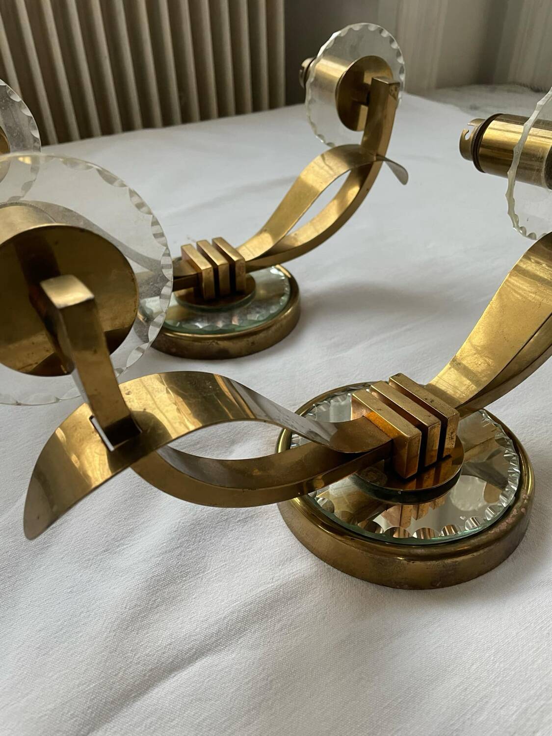 Vintage pair of art deco brass and mirrored glass wall lights France 1940