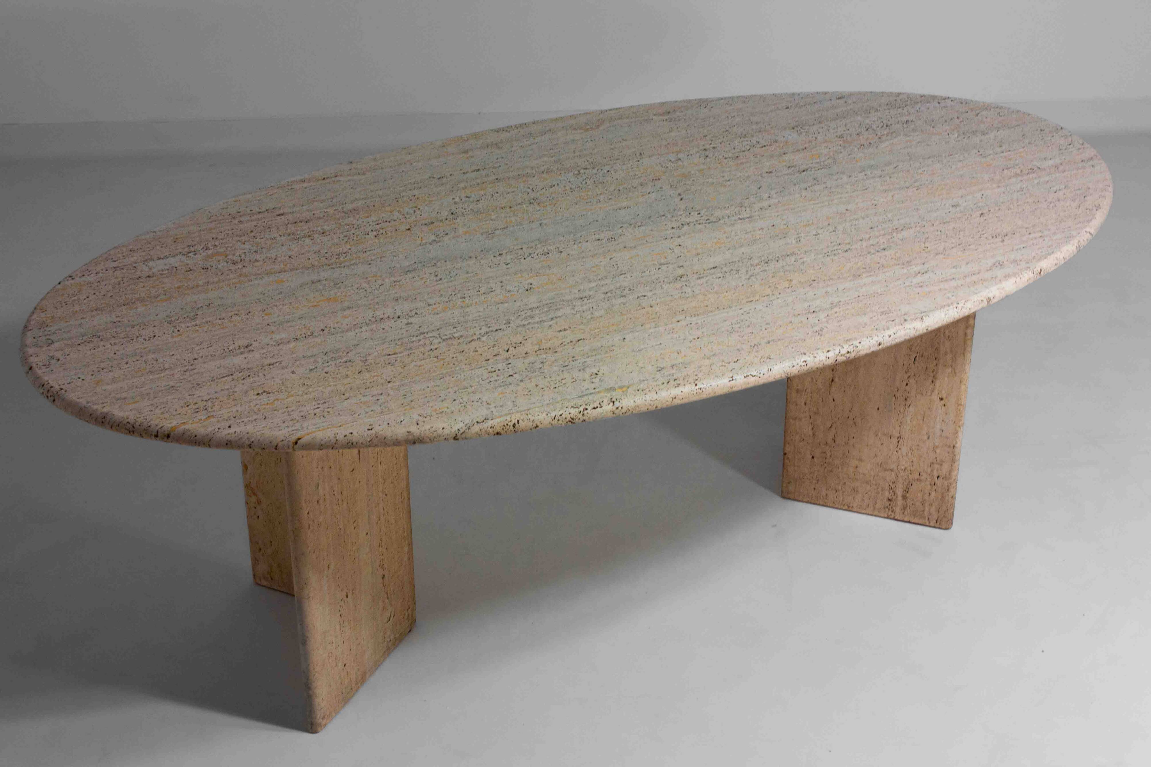 Large oval dining table in natural travertine, Italy 1970s