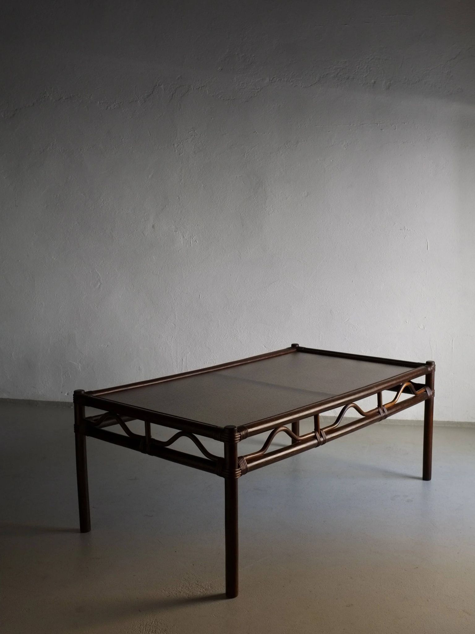 Dark rattan glass coffee table | 1980s