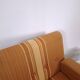 1970s retractable lounge chair in brown stripes with chrome tube frame.