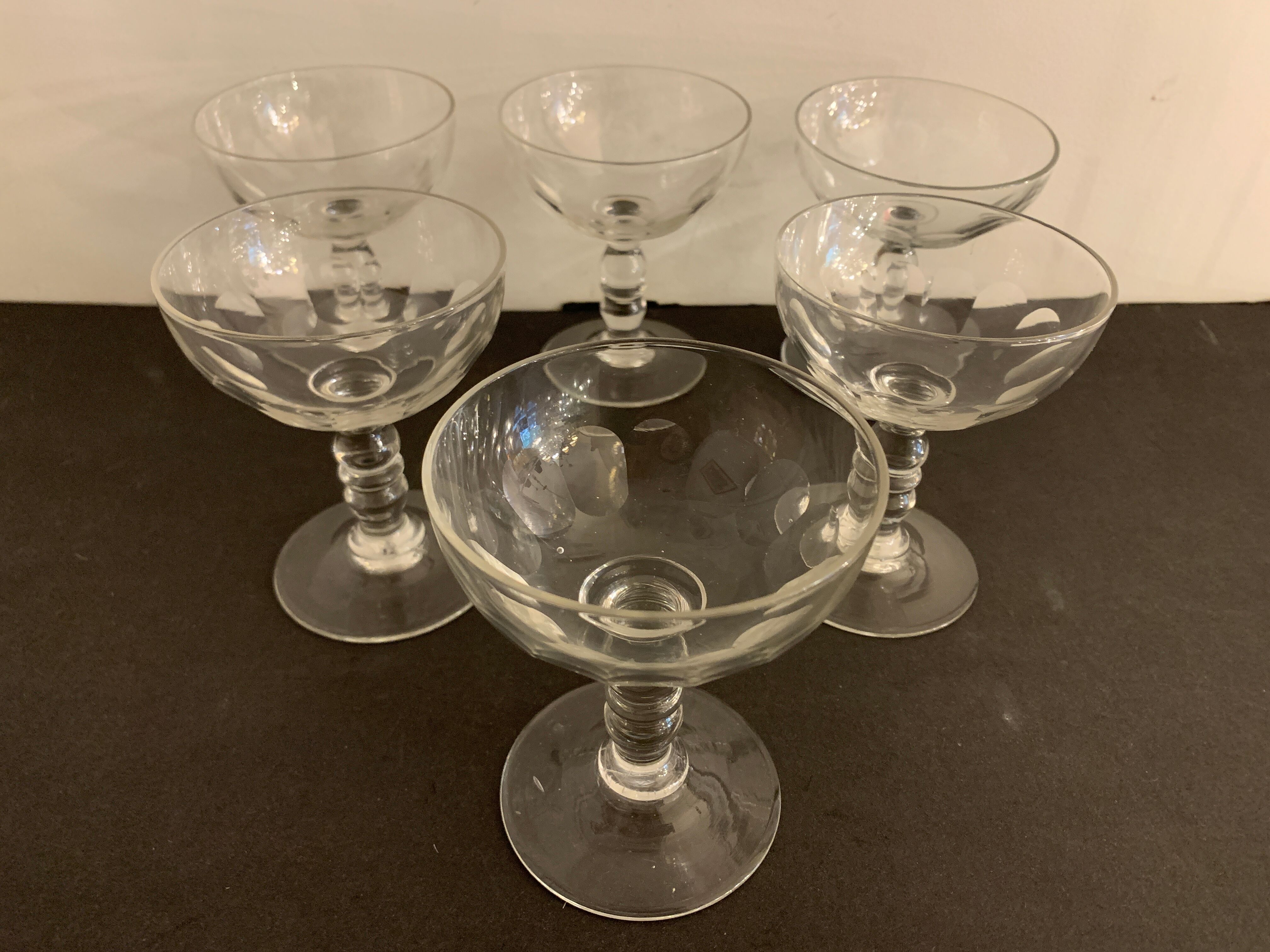 6 old champagne cups in faceted glass
