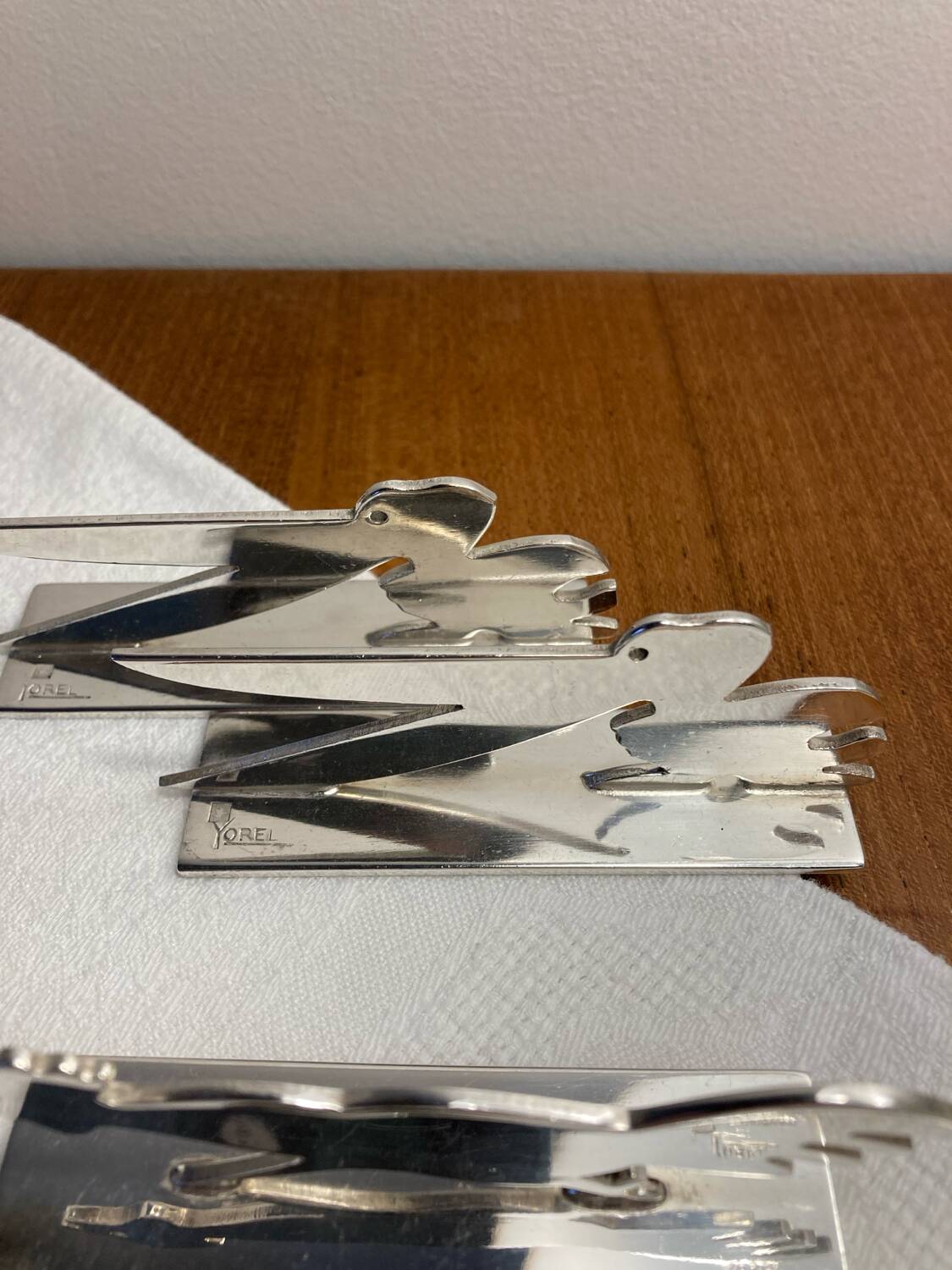 12 silver-plated metal knife rests Art Deco Yorel