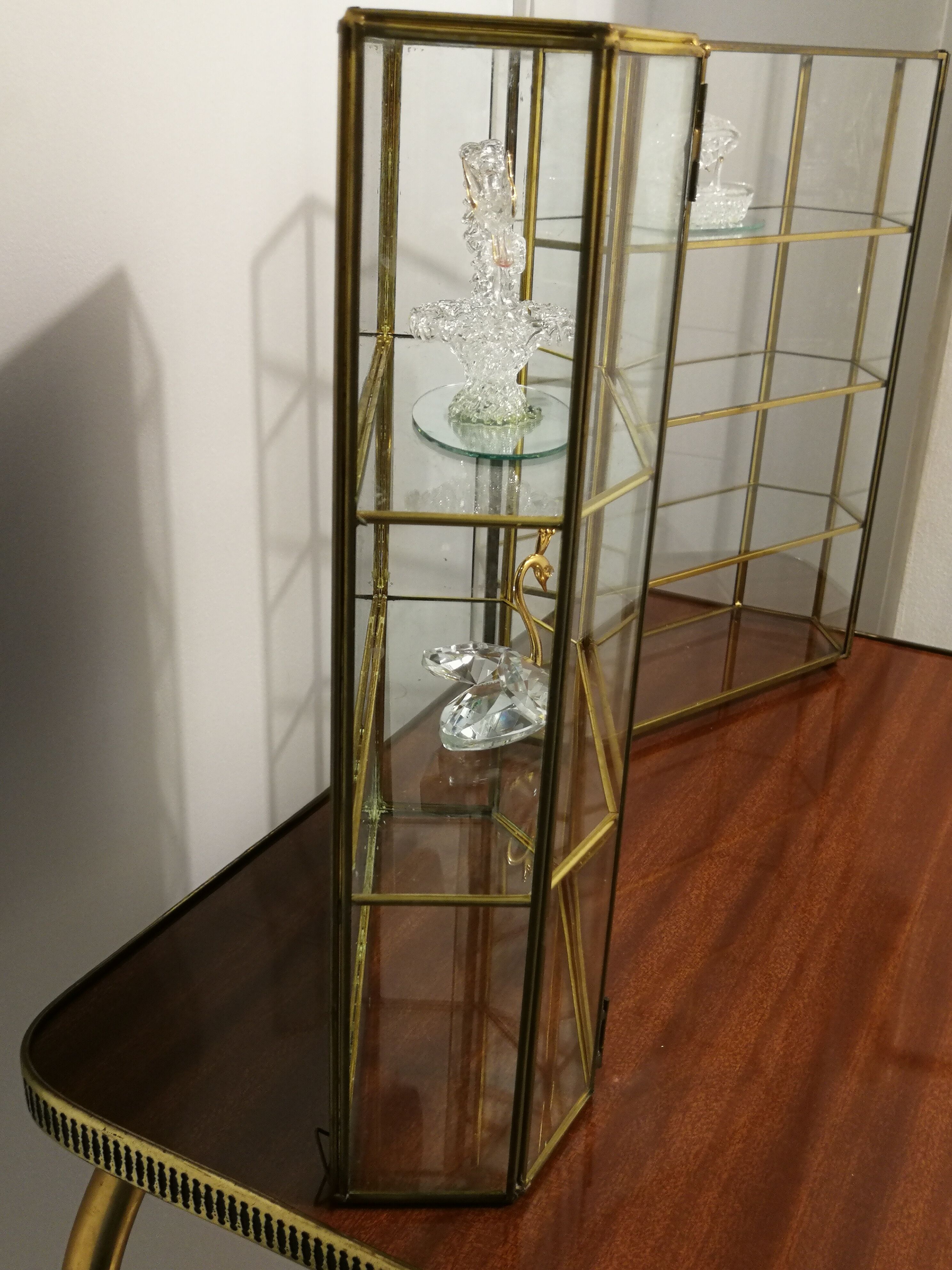 Duo of brass and glass showcases