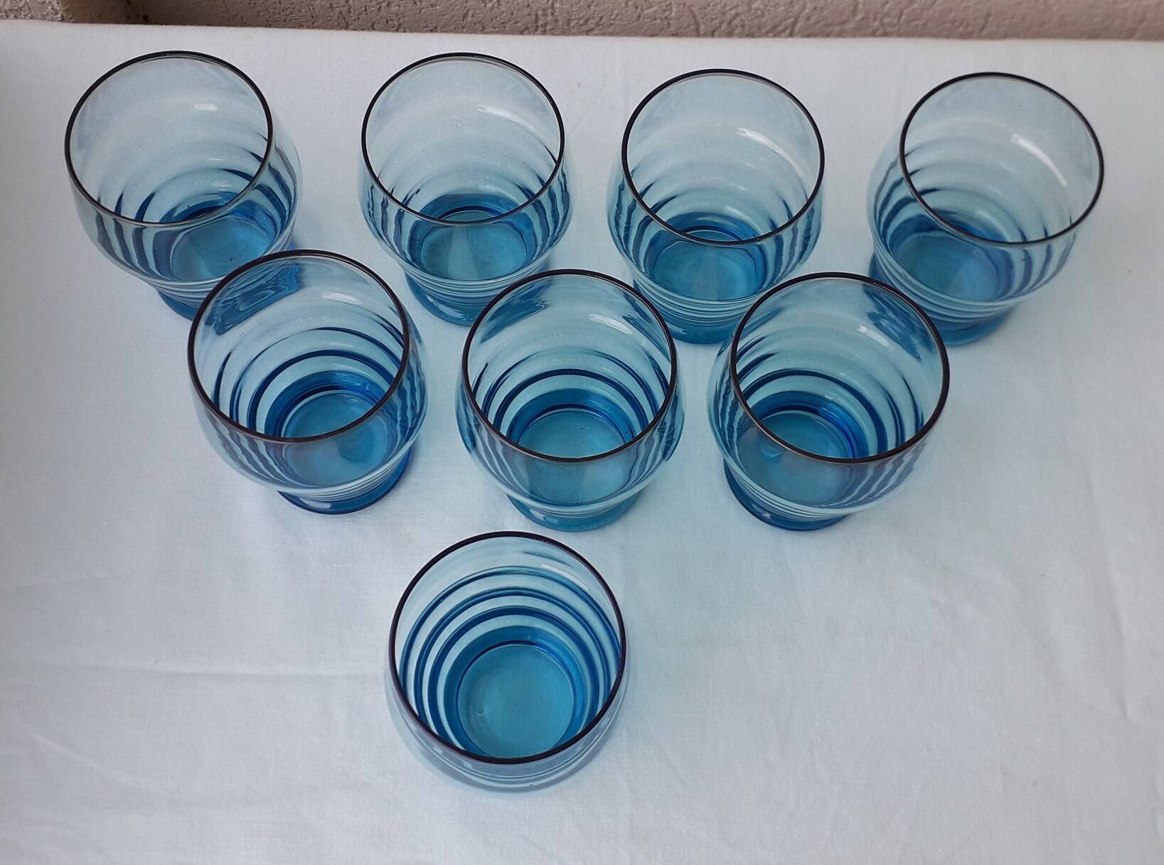 8 blue glasses