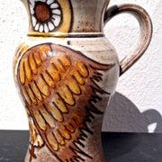 Stoneware water jug, owl decoration, signature to be identified.