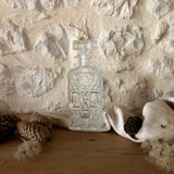 Large ornate glass carafe