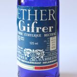 Blue glass bottle of ether